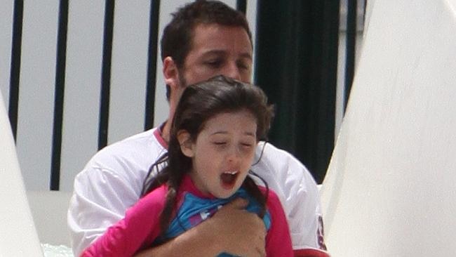 Adam Sandler's daughter Sunny looks terrified. Picture: Splash News