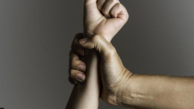 istock generic:  woman, abuse, DV, domestic violence, harassment, sexual harassment.   Parent is holding her little girls arm and is about to use violence. Representing child abuse and domestic violence. . Picture: istock