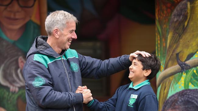 Principal Matthew Shawcross loves seeing Hewad Wali thriving in his school after all the violence he witnessed as a child in Afghanistan. Picture: David Caird