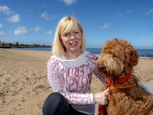 Susan Taylor started a petition calling for dogs to be allowed on all Port Phillip beaches over summer. Picture: Luis Enrique Ascui