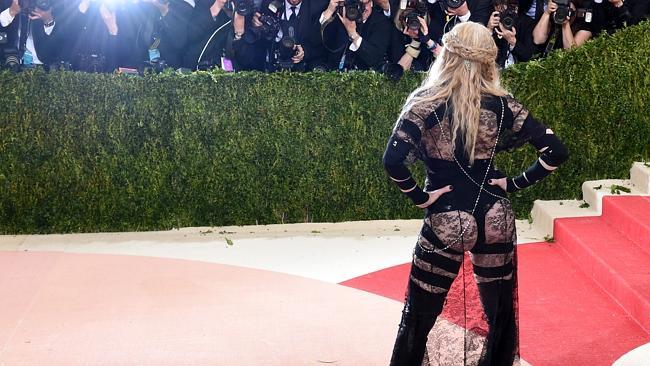 Madonna fronts the cameras. The cheek of her! Picture: AFP PHOTO / TIMOTHY A. CLARY