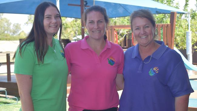 MAKING A DIFFERENCE: Georgia Walsh, Kate at Chinchilla C &amp; K bend over backyards daily for their additional needs students.