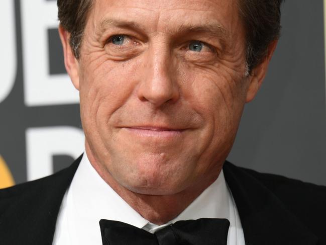 Hugh Grant arrives for the 75th Golden Globe Awards on January 7, 2018, in Beverly Hills, California. / AFP PHOTO / VALERIE MACON