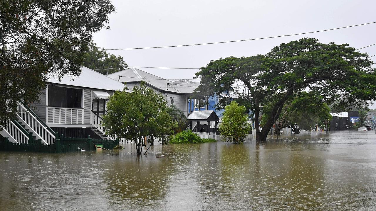 Water rising in East Brisbane on Sunday. Picture: John Gass