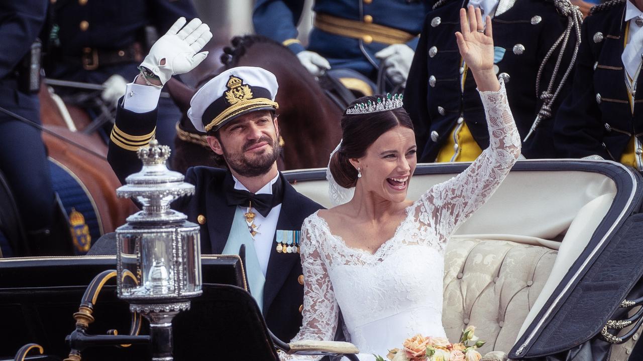 Prince Carl Philip of Sweden and Princess Sofia of Sweden ride in the wedding cortege after their marriage ceremony in Stockholm, Sweden. Picture: Ian Gavan/Getty Images.