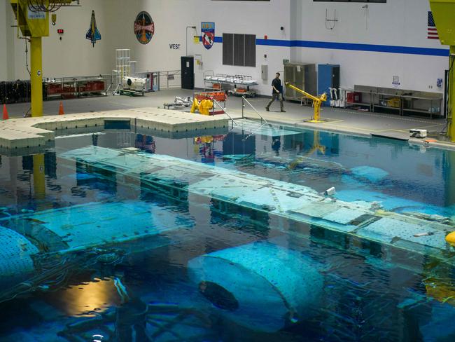 The training pool at the NASA Neutral Buoyancy Laboratory in the Jonson Space Center in Houston, Texas. Astronauts do some of their training under water to get used to the weightlessness of space. Picture: Mark Felix/AFP