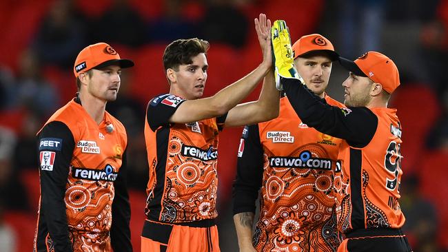 Jhye Richardson (second from left) celebrates with Scorchers teammates in the win over the Brisbane Heat. Picture: Quinn Rooney/Getty Images