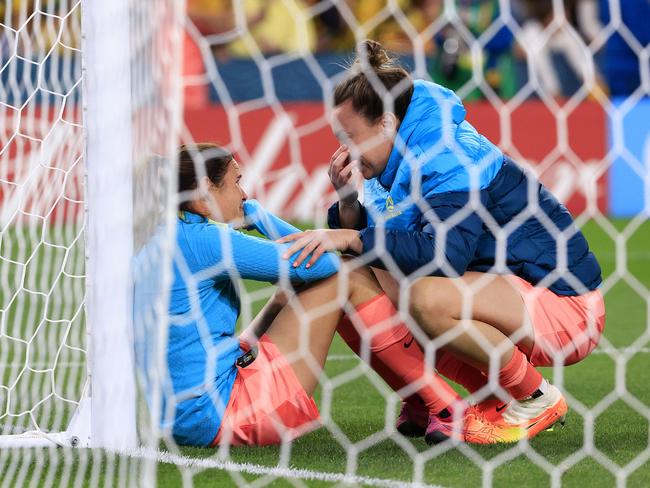 Australian keeper Lydia Williams and Mackenzie Arnold share a moment after the FIFA Women’s World Cup third place playoff loss to Sweden. Picture: Adam Head