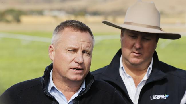 Deputy Premier Jeremy Rockliff, flanked by John Tucker, talking to reporters last year about the Tasmanian irrigation scheme at a potato farm in Kempton. Picture: MATHEW FARRELL