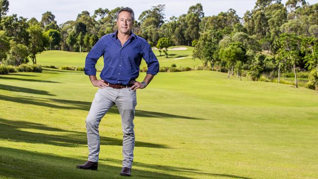 Justin Harrison from The Village Retirement Group at North Lakes Resort Golf Club. (AAP Image/Richard Walker)