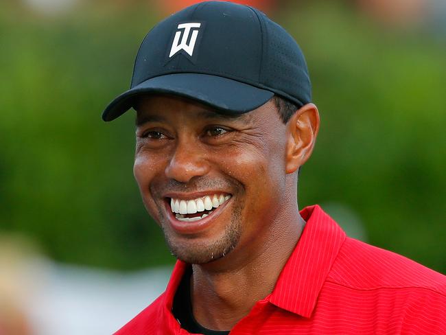 TOPSHOT - ATLANTA, GA - SEPTEMBER 23: Tiger Woods of the United States reacts during the trophy presentation ceremony after winning the TOUR Championship at East Lake Golf Club on September 23, 2018 in Atlanta, Georgia.   Kevin C. Cox/Getty Images/AFP (Photo by Kevin C. Cox / GETTY IMAGES NORTH AMERICA / AFP)