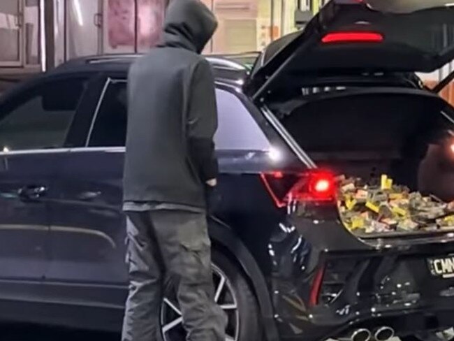 A gang of masked teens have been filmed during an alleged armed robbery at a Melbourne service station. Picture: Instagram/kiwiaussieproud