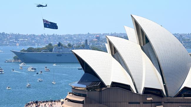 The Navy Seahawk helicopter’s flypast included Sydney Harbour. Picture: AAP