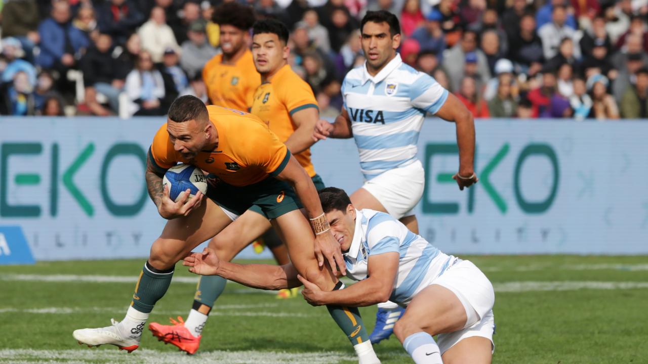 MENDOZA, ARGENTINA - AUGUST 06: Quade Cooper of Australia is tackled by Santiago Carreras of Argentina during The Rugby Championship match between Argentina Pumas and Australian Wallabies at Estadio Malvinas Argentinas on August 06, 2022 in Mendoza, Argentina. (Photo by Daniel Jayo/Getty Images)