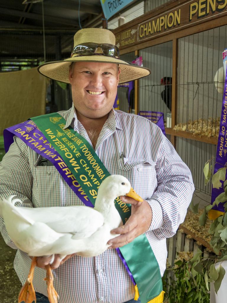 Bob Walsh with his Mallard white male young drake that won the Reserve Water Fowl at the Toowoomba Royal Show. Saturday, March 26, 2022. Picture: Nev Madsen.