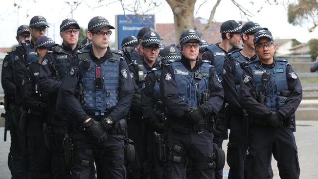 Police keep an eye on protesters. Picture: David Geraghty