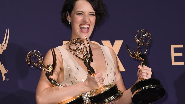 TOPSHOT - British actress Phoebe Waller-Bridge poses with the Emmy for Outstanding Writing for a Comedy Series, Outstanding Lead Actress In A Comedy Series and Outstanding Comedy Series for "Fleabag" during the 71st Emmy Awards at the Microsoft Theatre in Los Angeles on September 22, 2019. (Photo by Robyn Beck / AFP)