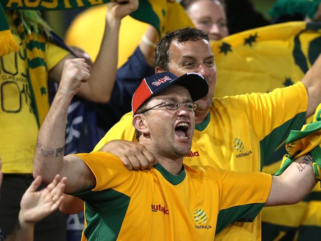 NEWCASTLE, AUSTRALIA - JANUARY 27: Socceroos fans cheer on their team during the Asian Cup Semi Final match between the Australian Socceroos and the United Arab Emirates at Hunter Stadium on January 27, 2015 in Newcastle, Australia. (Photo by Tony Feder/Getty Images)