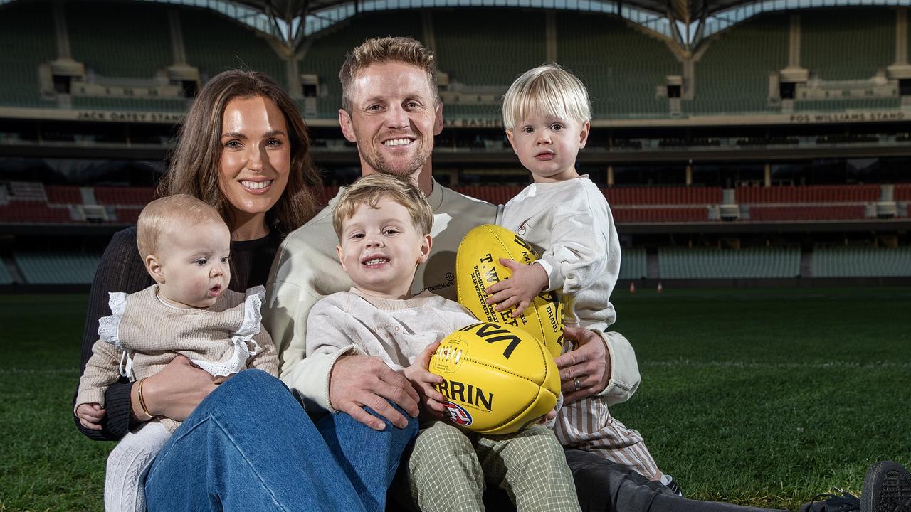 Rory Sloane poses with his family, wife Belinda, daughter Summer Maree, Bodhi, and Sonny at Adelaide Oval. Picture: Sarah Reed/Getty Images