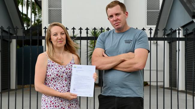 Claire Gawler and Aaron Thomas outside the land that contains their investment property. Picture: Isaac McCarthy