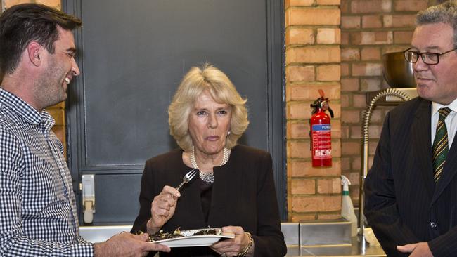 London 26/01/2015. Camilla, The Duchess of Cornwall attends a reception in celebration of Australia's People, Produce and Place to mark Australia Day. Masterchef runner up Lynton Tapp cooks some Australian dishes. Australian High Commissioner Alexander Downer (right). Picture: Ella Pellegrini