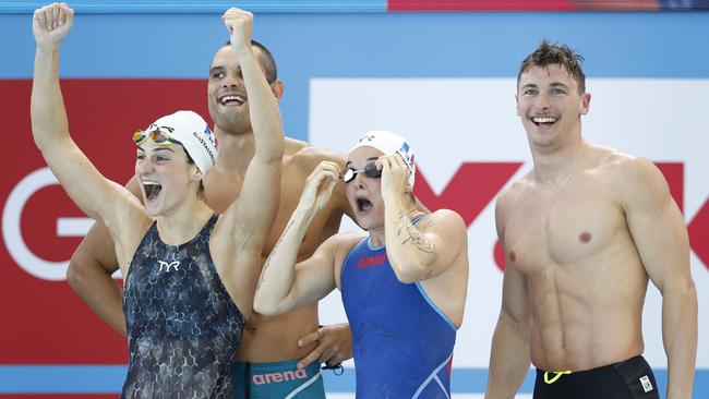 Maxime Grousset, Florent Manaudou, Beryl Gastaldello and Melanie Henique of France celebrate winning gold in the Mixed 4x50m Freestyle Final, in a new world record time of 1:27.33. (Photo by Daniel Pockett/Getty Images)