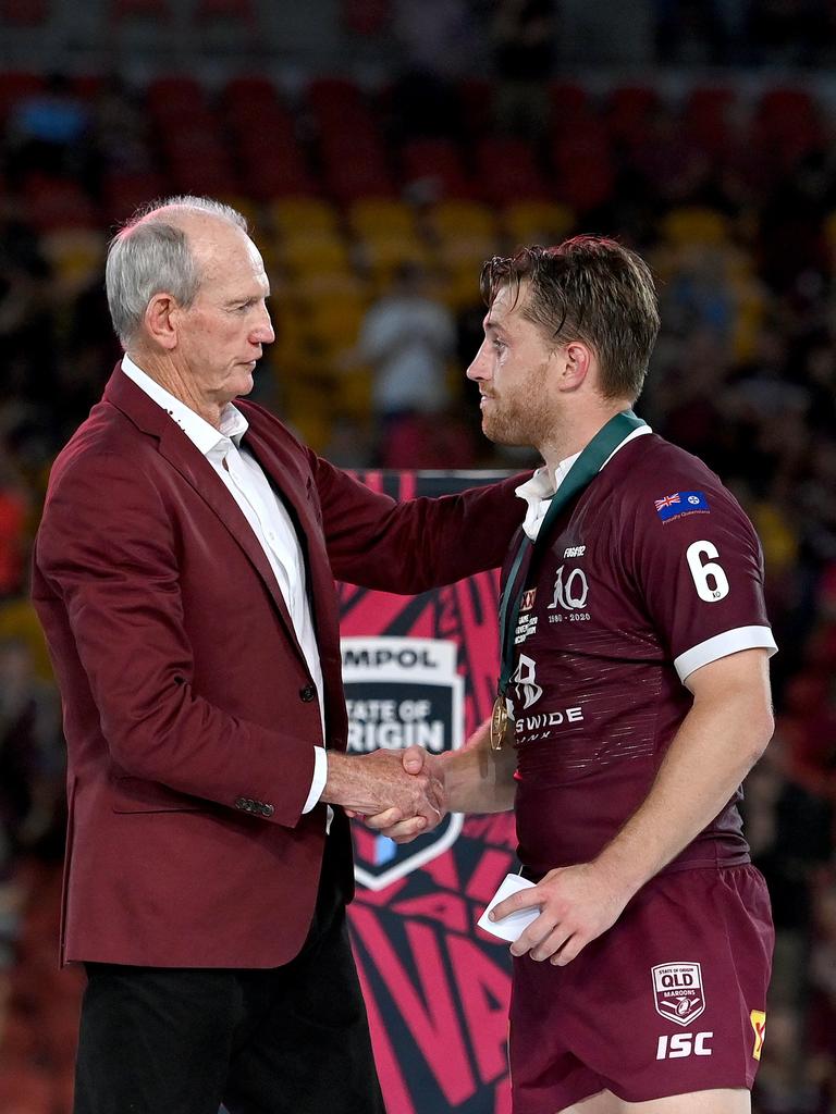 Cameron Munster (R) and Wayne Bennett in 2020. Picture: Bradley Kanaris/Getty