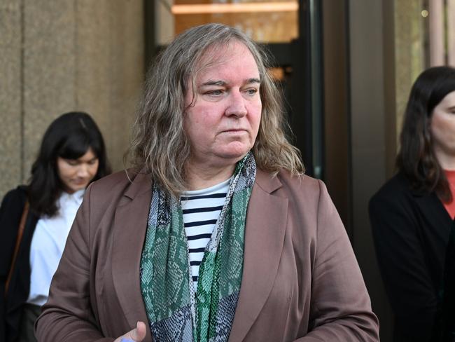 Roxanne Tickle leaves the Federal Court of Australia in Sydney, Friday, August 23, 2024. Transgender woman Roxanne Tickle was barred from using the female-only platform Giggle for Girls and has accused the social media site of discrimination. (AAP Image/Dean Lewins) NO ARCHIVING