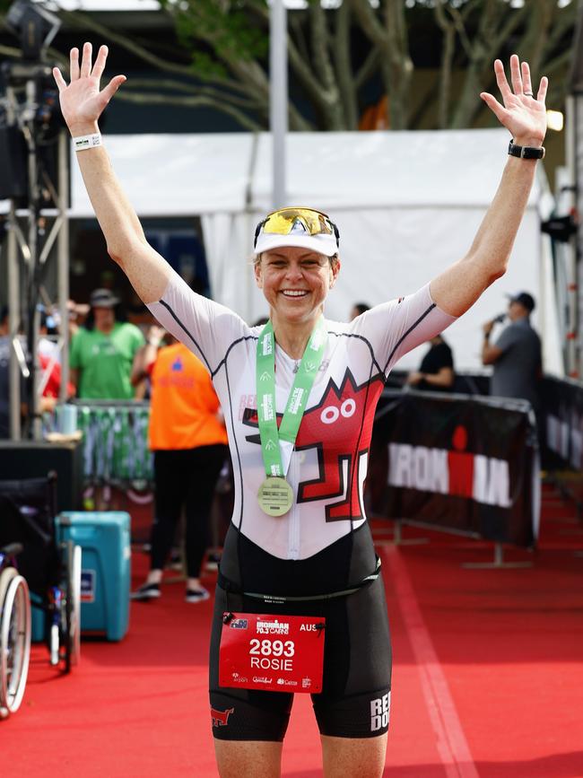 Rosie McGeoch celebrates after winning the women's Ironman Cairns 70.3 race. Picture: Brendan Radke