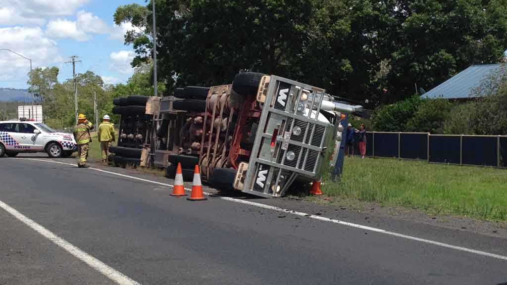 Cattle are trapped in the wreckage of this truck rollover on the Warrego Hwy at Helidon.