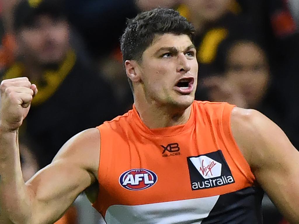 Jonathon Patton of the Giants reacts after kicking a goal during the Round 15 AFL match between the Greater Western Sydney (GWS) Giants and the Hawthorn Hawks at Spotless Stadium in Sydney, Saturday, June 30, 2018. (AAP Image/David Moir) NO ARCHIVING, EDITORIAL USE ONLY