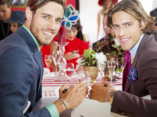 Jordan and Zac Stenmark enjoy caviar at the G.H. Mumm marquee at the Melbourne Cup Day 2014 at Flemington. Picture: Nathan Dyer