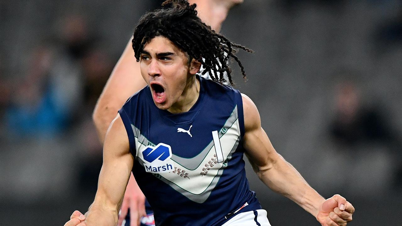 MELBOURNE, AUSTRALIA - JULY 14: Isaac Kako of Victoria Metro celebrates kicking a goal during the 2024 Marsh AFL Championships U18 Boys match between Victoria Metro and Victoria Country at Marvel Stadium on July 14, 2024 in Melbourne, Australia. (Photo by Josh Chadwick/AFL Photos)