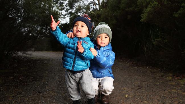 Ollie Smith 18 months with brother Angus Smith 4 of Lindisfarne rugged up for the cold at The Springs. Freezing conditions and snow on the way for Tassie. Picture: Nikki Davis-Jones