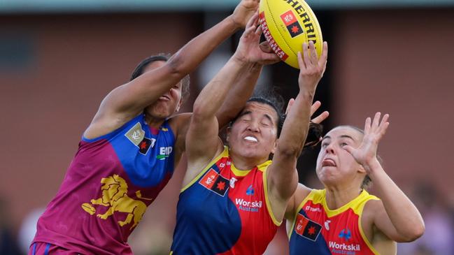 BRISBANE, AUSTRALIA - SEPTEMBER 29: Courtney Hodder of the Lions and Rachelle Martin of the Crows compete for the ball during the 2024 AFLW Round 05 match between the Brisbane Lions and the Adelaide Crows at Brighton Homes Arena on September 29, 2024 in Ipswich, Australia. (Photo by Russell Freeman/AFL Photos via Getty Images)