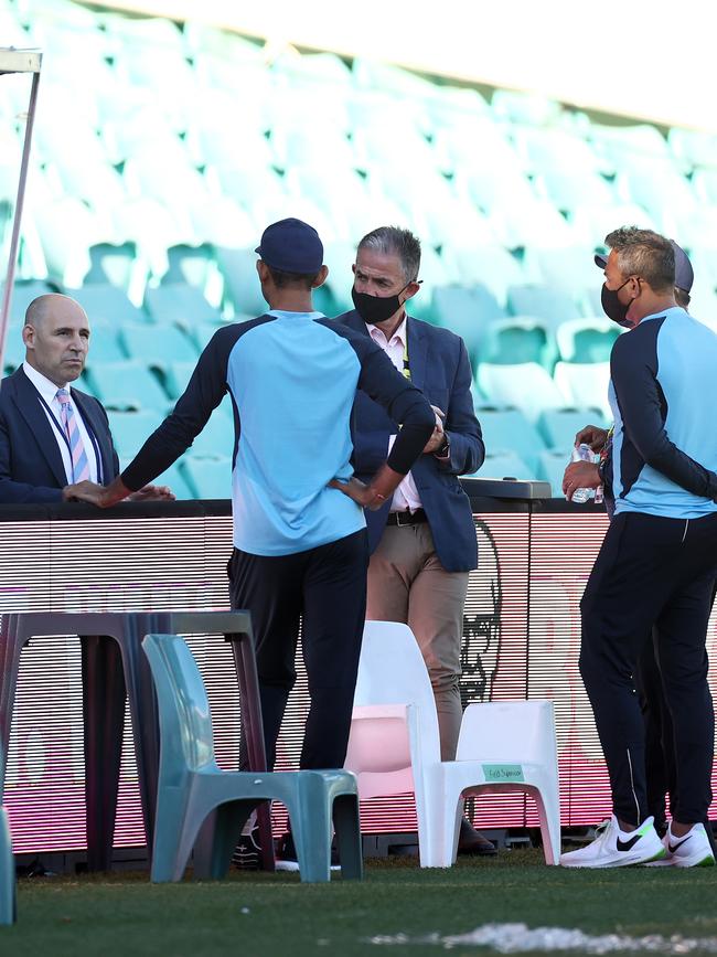 Cricket Australia CEO Nick Hockley and Cricket Australia Head of Integrity and Security Sean Carroll speak with Indian team management after day three of the Third Test. Picture: Getty Images