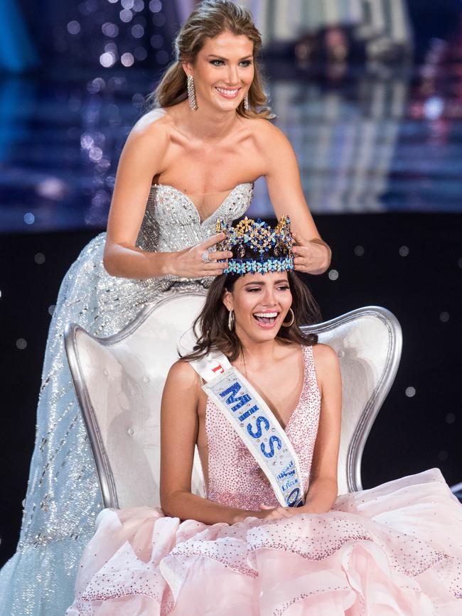 Miss World 2015 Mireia Lalaguna of Spain crowns Miss Puerto Rico Stephanie Del Valle during the Miss World 2016 pageant at the MGM National Harbor December 18, 2016 in Oxon Hill, Maryland. Picture: AFP