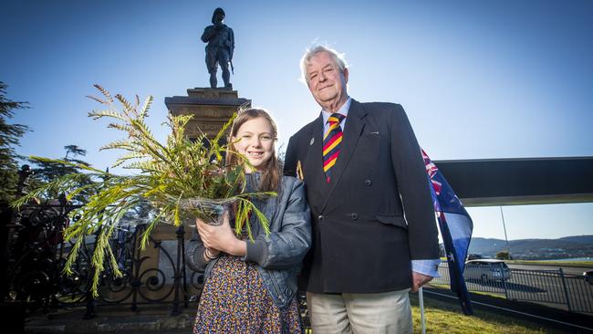 Gracie Ryan, 9 and her grandfather, Tasmanian historian Reg Watson laid a wreath to commemorate the Boer War at the memorial on Queens Domain. Picture: LUKE BOWDEN