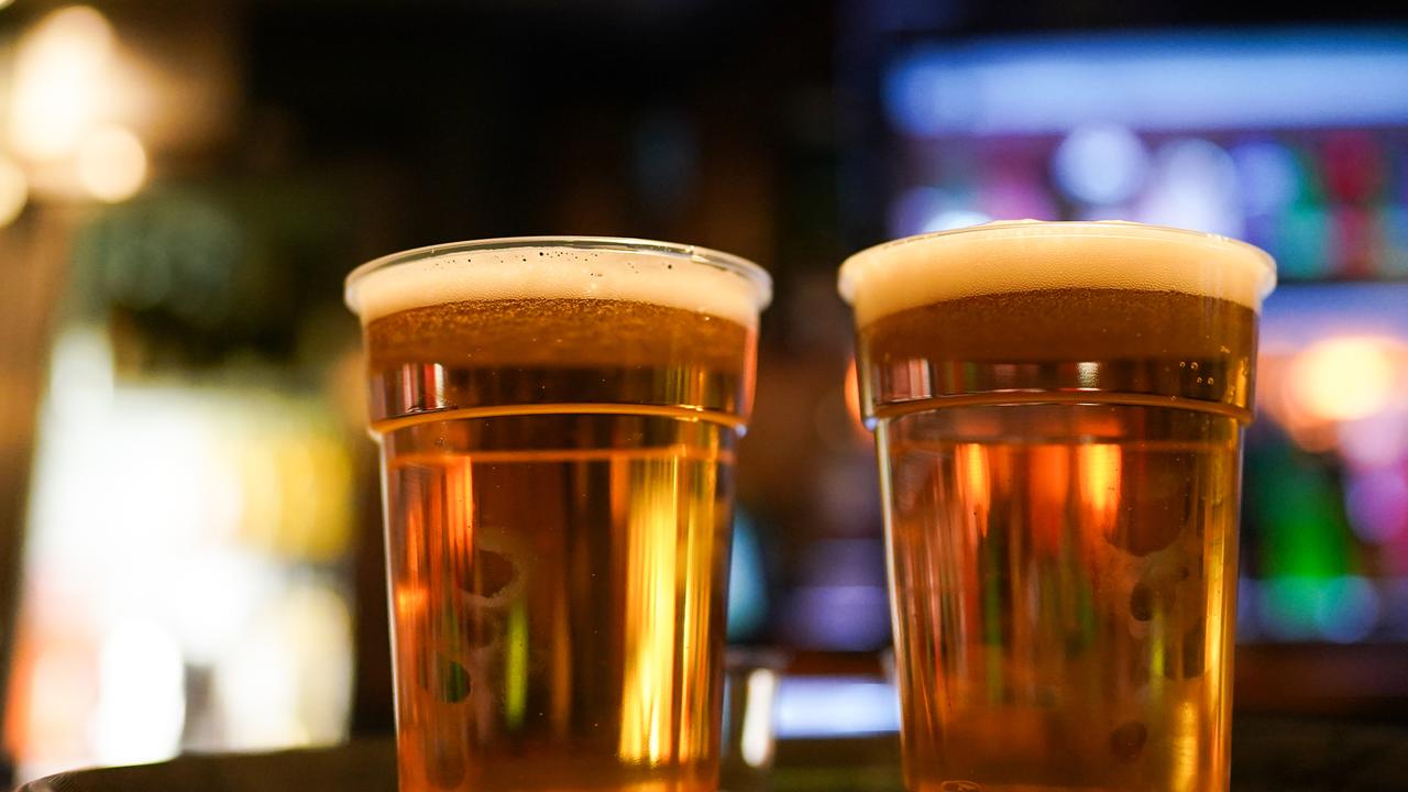 Some pubs opened at midnight for those who couldn't wait until Monday evening. (Photo by Ian Forsyth/Getty Images).