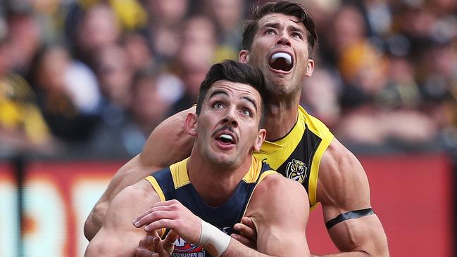 Alex Rance wrestles with Adelaide's Taylor Walker in the grand final. Picture. Phil Hillyard