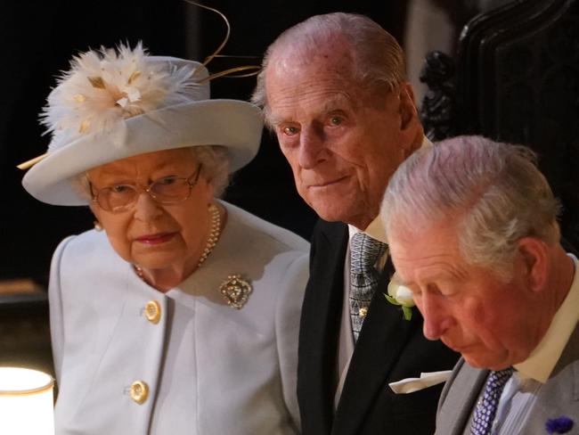 Queen Elizabeth II Prince Philip, Duke of Edinburgh and Prince Charles, Prince of Wales attend the wedding of Princess Eugenie of York in 2018.