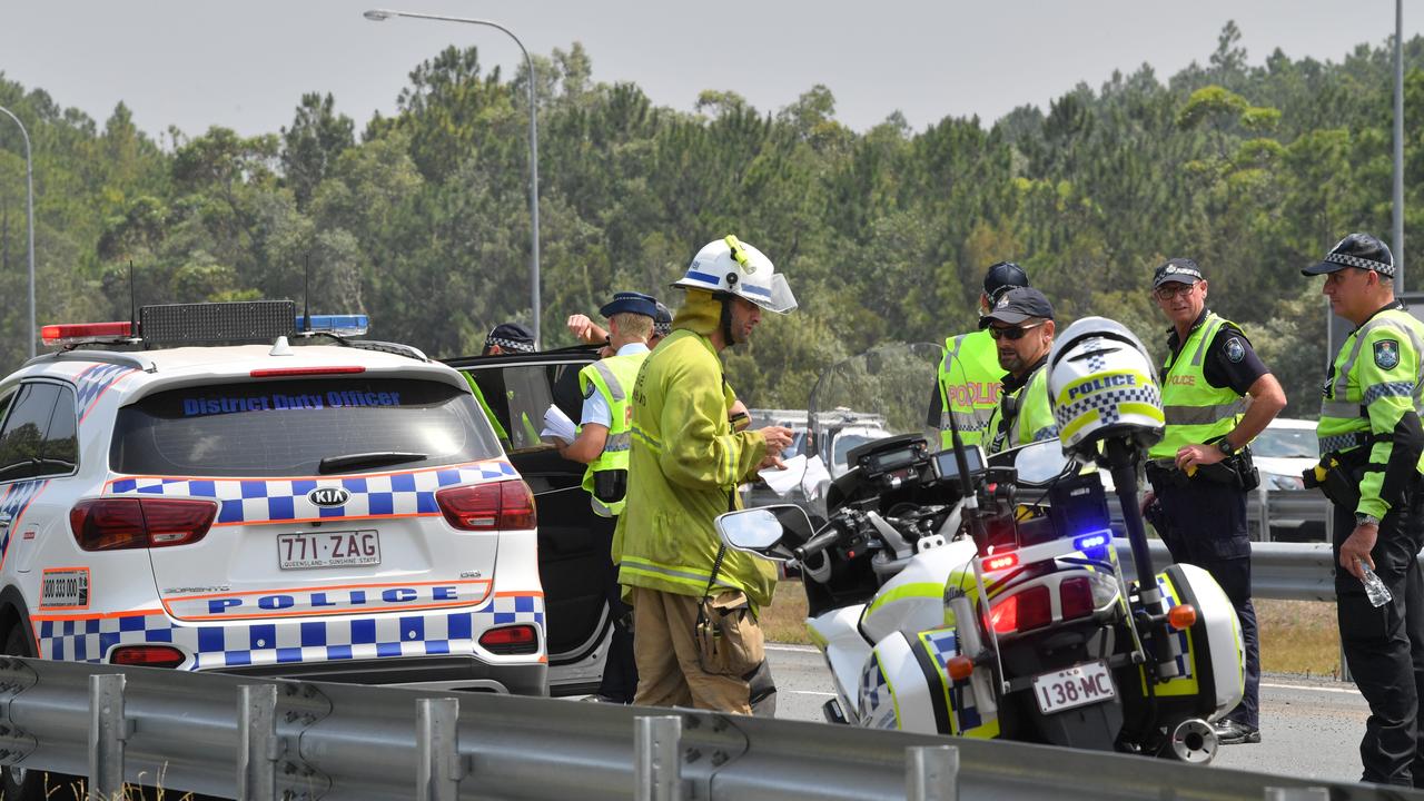 Police apprehended a man and woman at gunpoint after they led emergency services on a car chase from Hervey Bay. The alleged stolen car ended up on its roof and the occupants were taken into custody. Photo: John McCutcheon / Sunshine Coast Daily