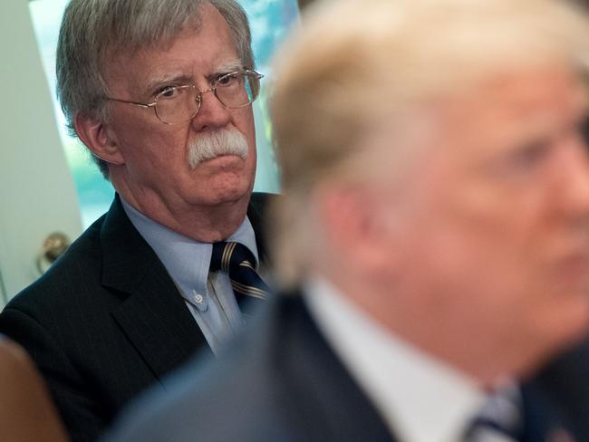 US President Donald Trump speaks alongside then National Security Adviser John Bolton in 2018.