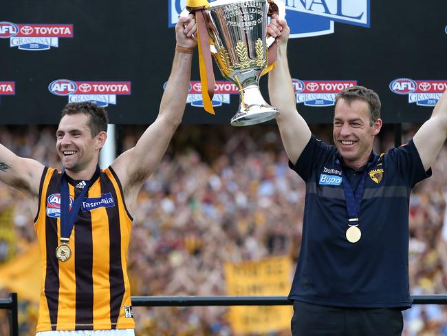 Luke Hodge of Hawthorn and Alastair Clarkson coach of Hawthorn with the cup after the 2015 AFL Grand Final between the Hawthorn Hawks and the West Coast Eagles played at the Melbourne Cricket Ground on Saturday, October 3, 2015, in Melbourne, Victoria, Australia. AFLGF2015 MCGPicture: Wayne Ludbey