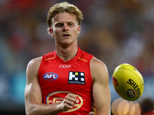 GOLD COAST, AUSTRALIA - APRIL 13: Bodhi Uwland of the Suns warms up during the round five AFL match between Gold Coast Suns and Hawthorn Hawks at People First Stadium, on April 13, 2024, in Gold Coast, Australia. (Photo by Chris Hyde/Getty Images)