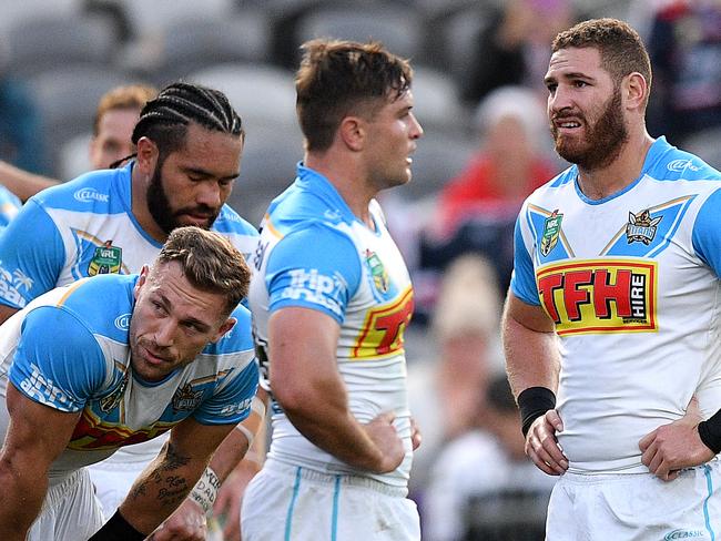 Titans players look on after conceding a try during the Round 12 NRL match between the Sydney Roosters and the Gold Coast Titans at Central Coast Stadium in Gosford, Saturday, May 26, 2018. (AAP Image/Dan Himbrechts) NO ARCHIVING, EDITORIAL USE ONLY