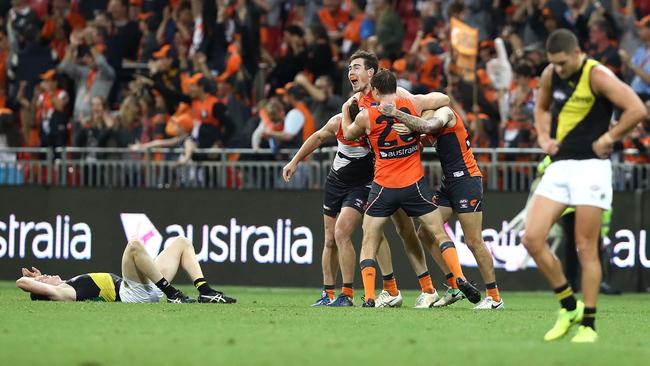 The Giants celebrate after stealing victory from Richmond.