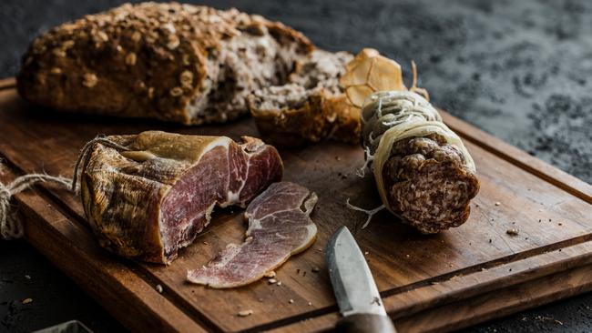 A combo of dried ham, sausage and rustic bread is one of several delicious offerings that go very well with a glass or two of ‘plonk’, at Larder &amp; Vin. Picture: Supplied by Larder &amp; Vin