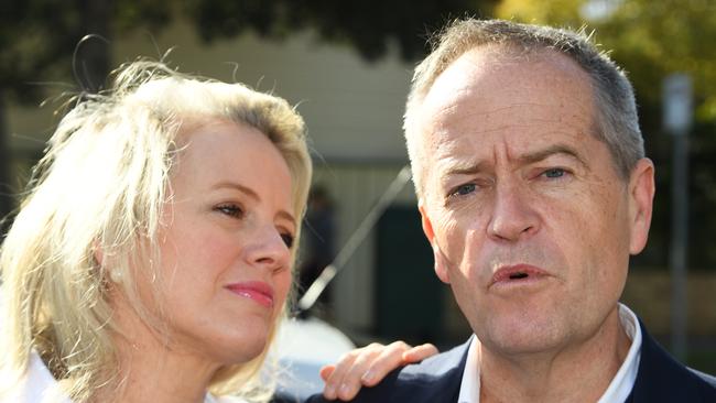 Federal leader of the Opposition Bill Shorten (right) speaks to media aside wife Chloe outside their property in Moonee Ponds, Melbourne. Picture: AAP/James Ross