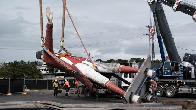 The historic moment the Captain James Cook statue in Cairns was taken down. Picture: Matthew Newton